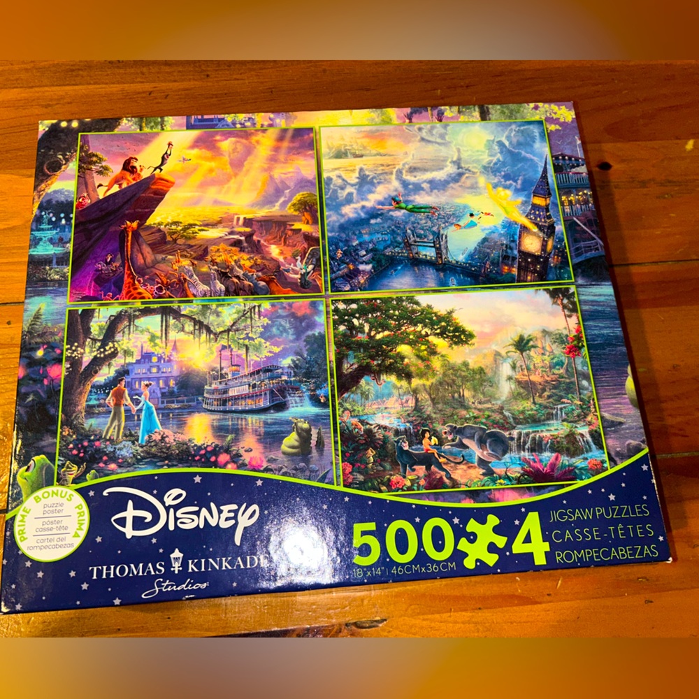 Disney Thomas Kinkade Studio Four 500 Piece Puzzles 18”x24”.